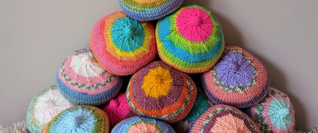 Knitted breasts in different colours.
