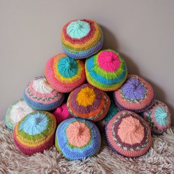 Knitted breasts in different colours.